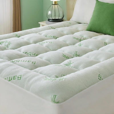 Surmatelas bambou vert clair sur lit