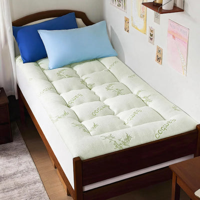 Surmatelas bambou sur lit en bois