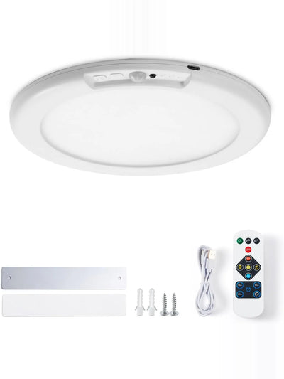 Plafonnier LED rond à détecteur de mouvement vu de dessus, avec sa plaque aimantée, ses vis et sa télécommande